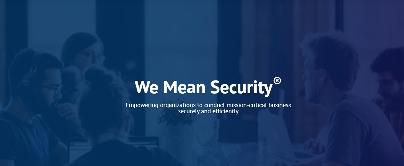 We Mean Security banner with small group of people working around a table and blue purple gradient overlay